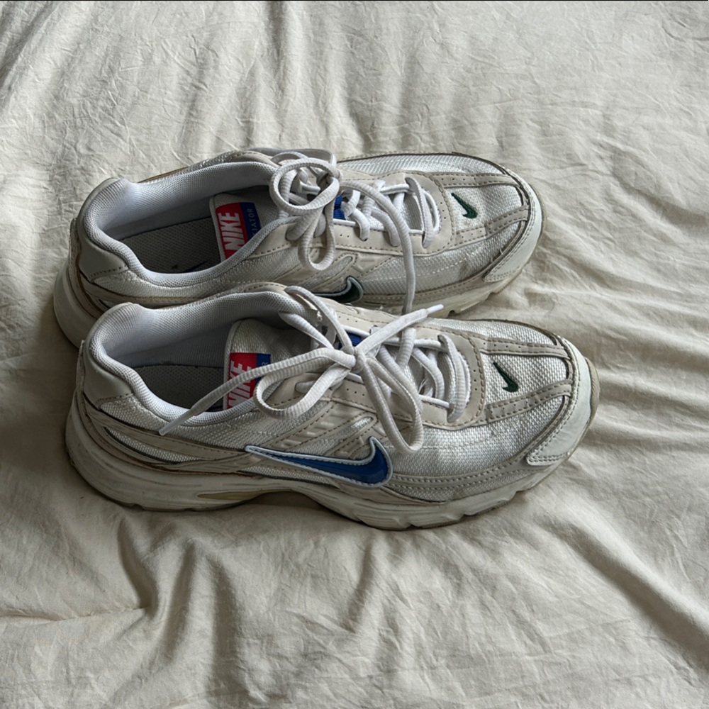Nike White Running Shoes with Blue Swoosh and Green Accents